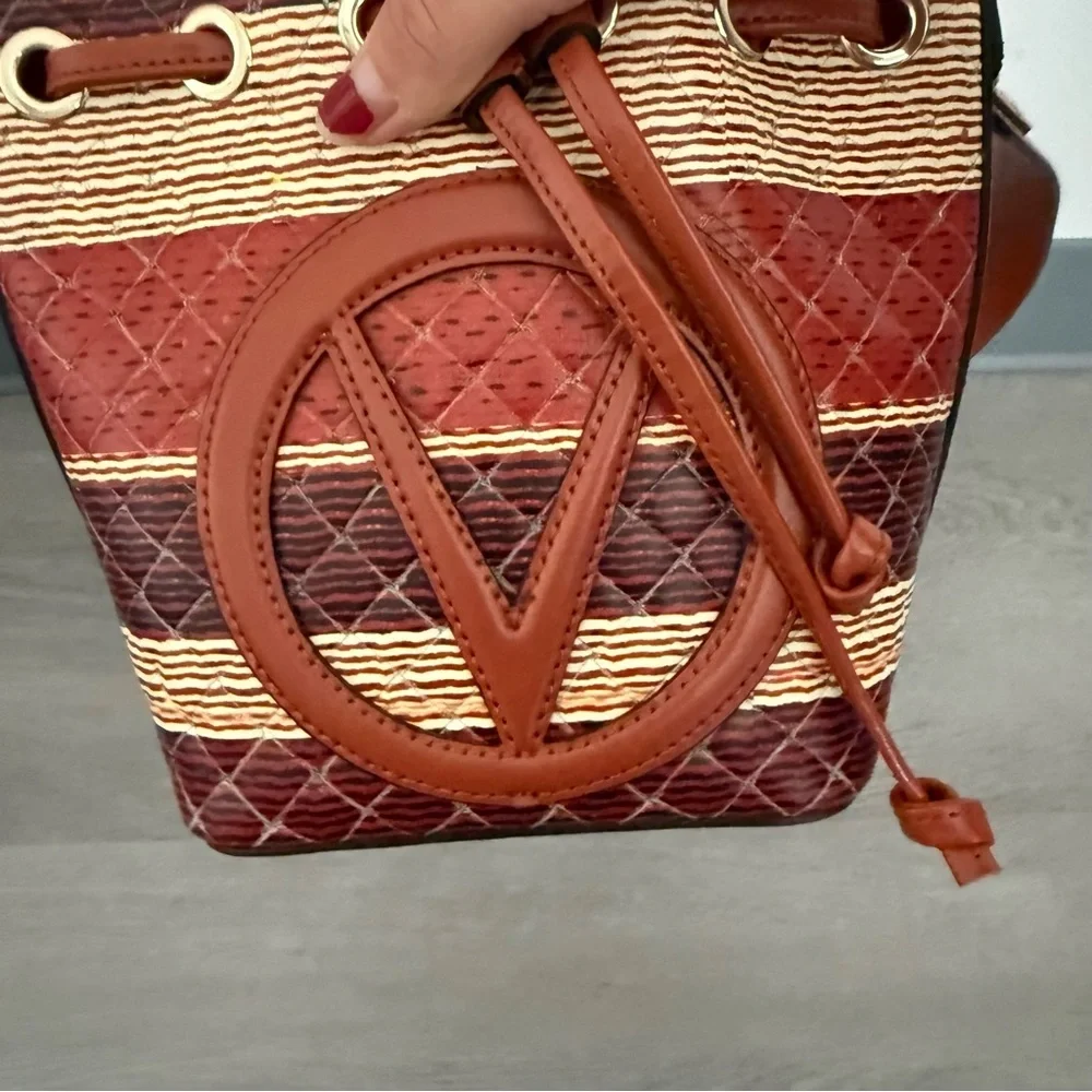 Valentino by Mario Valentino Bag Jules Tresse Drawstring Bucket Bag in Umber